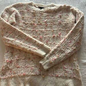 Beautifully detailed tunic length crewneck sweater